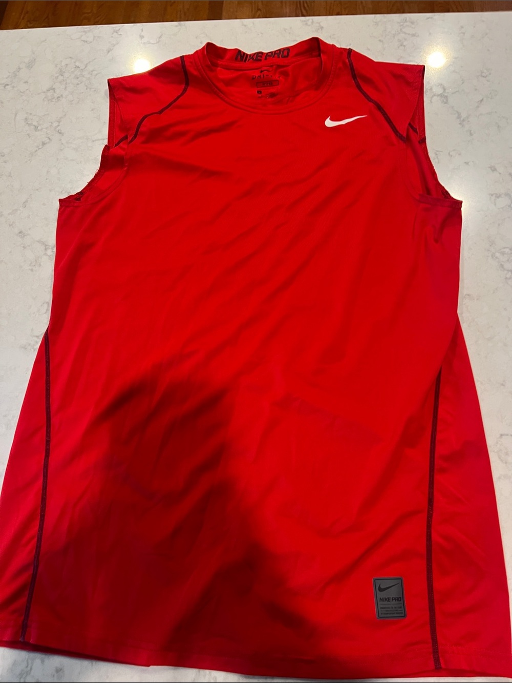 Nike Red Sleeveless Training Top with White Swoosh